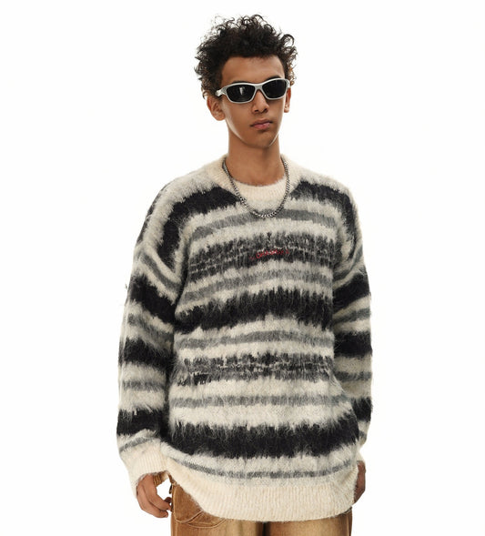 Suéter de punto a rayas color crema y negro