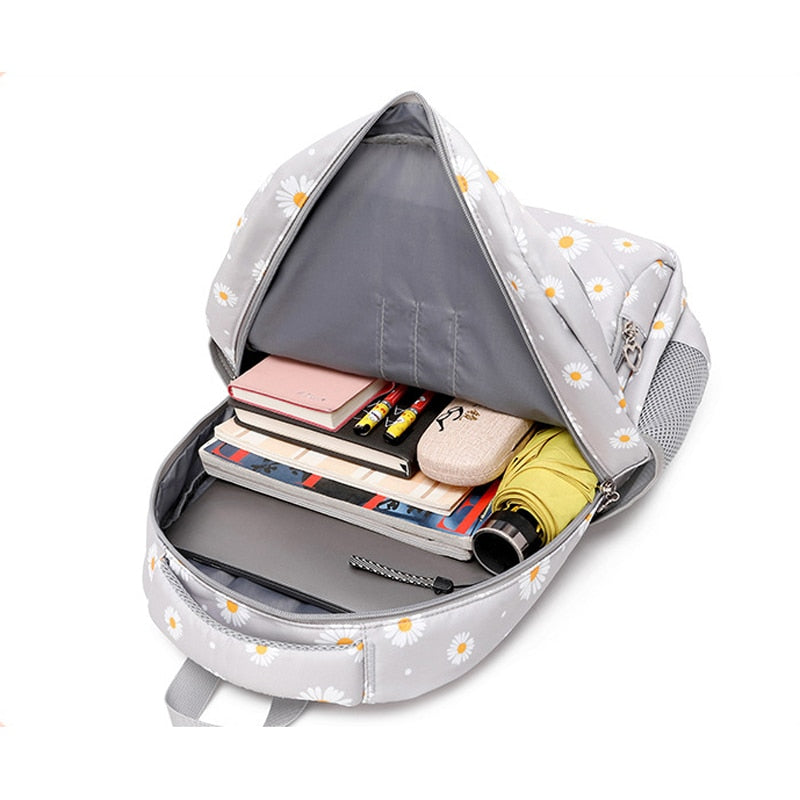 Conjunto de 3 mochilas escolares con diseño de margaritas