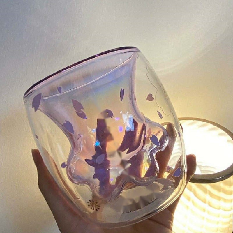Tasse à patte de chat en fleurs de cerisier