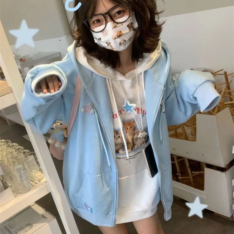 Sweat à capuche zippé en polaire