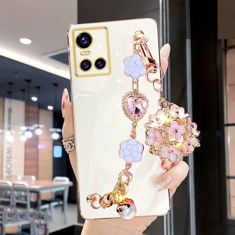 Funda para teléfono con colgante de gemas y flores