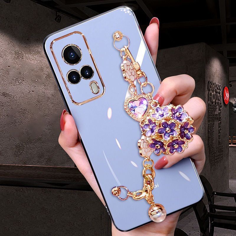 Funda para teléfono con colgante de gemas y flores