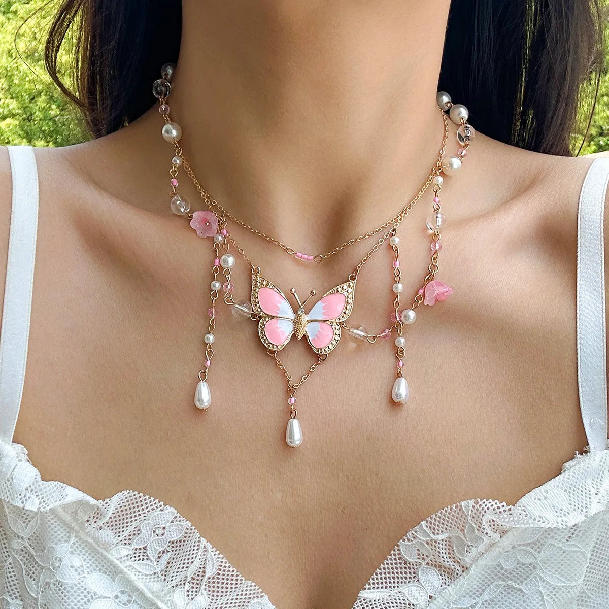 Collier multicouche en perles d'imitation papillon