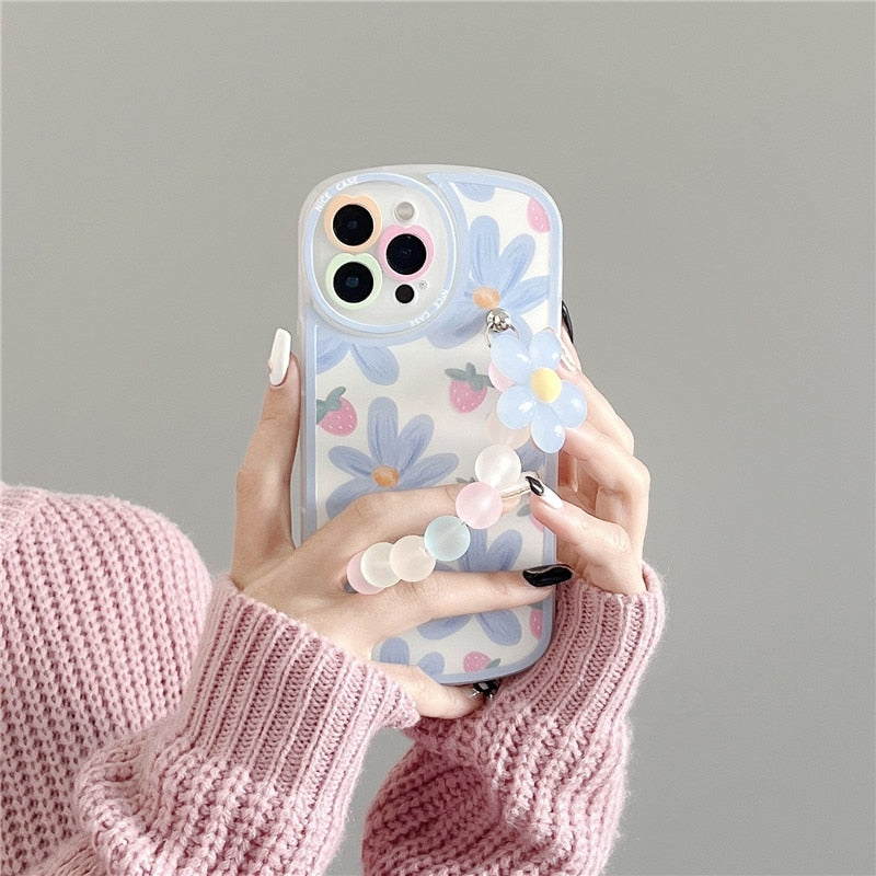 Funda blanda para iPhone con diseño de flores y cadenas