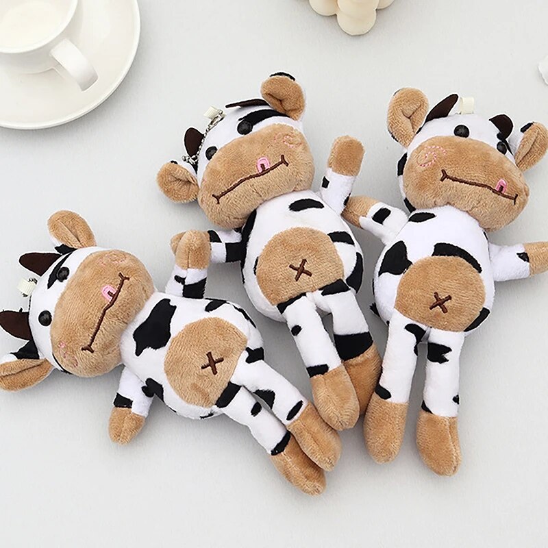 Llavero con colgante de peluche de vaca