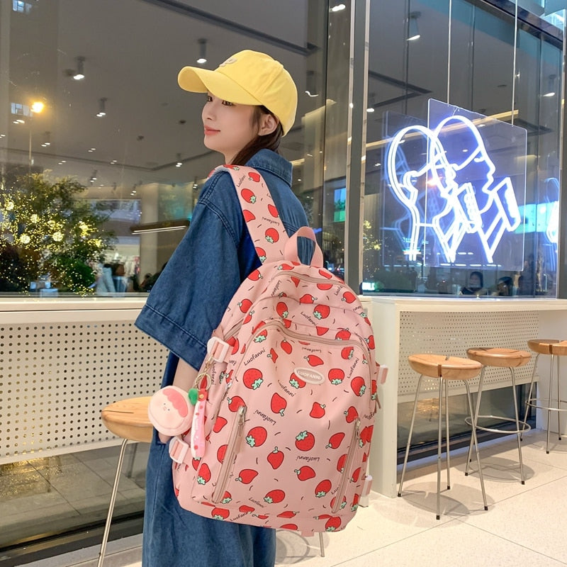 Sac à dos imperméable à imprimé fraise