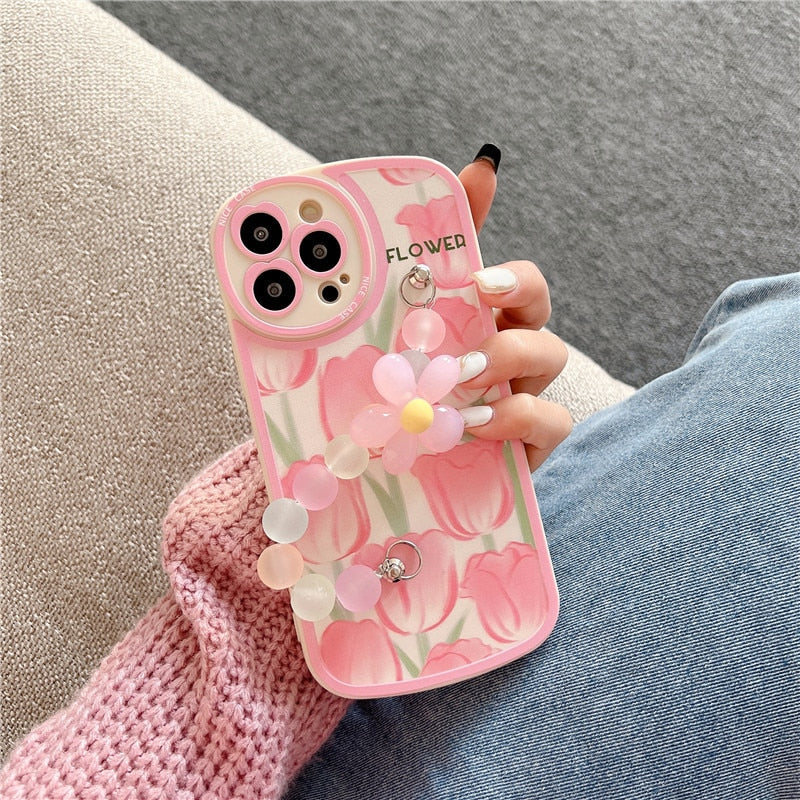 Funda blanda para iPhone con diseño de flores y cadenas