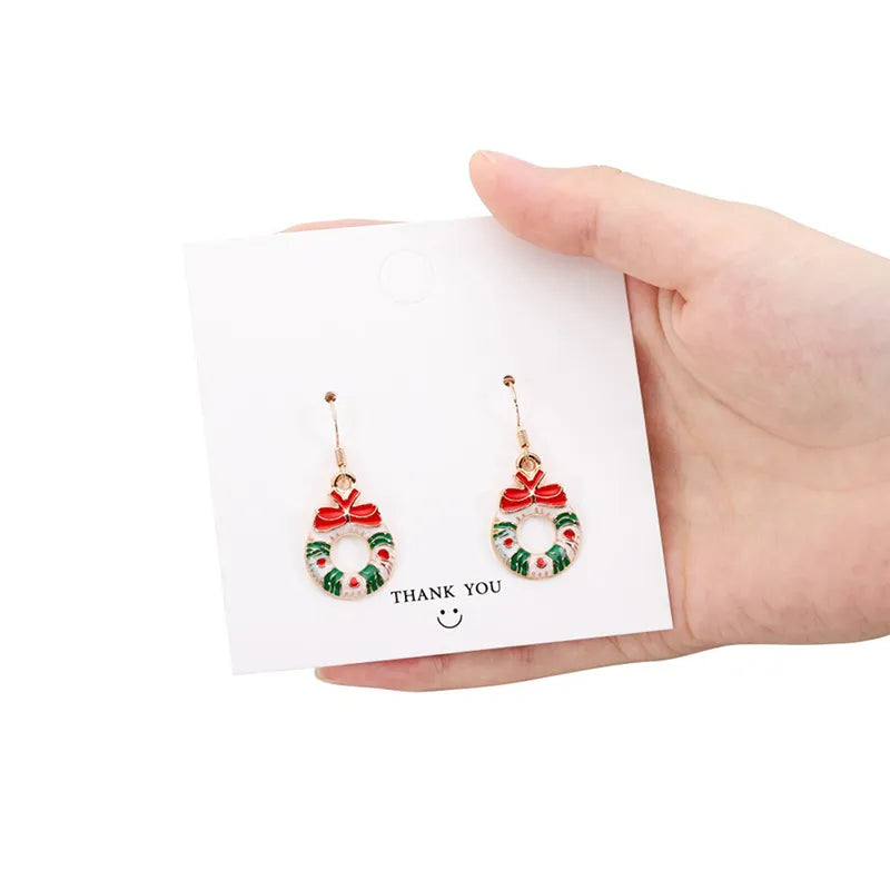 Boucles d'oreilles pendantes de Noël