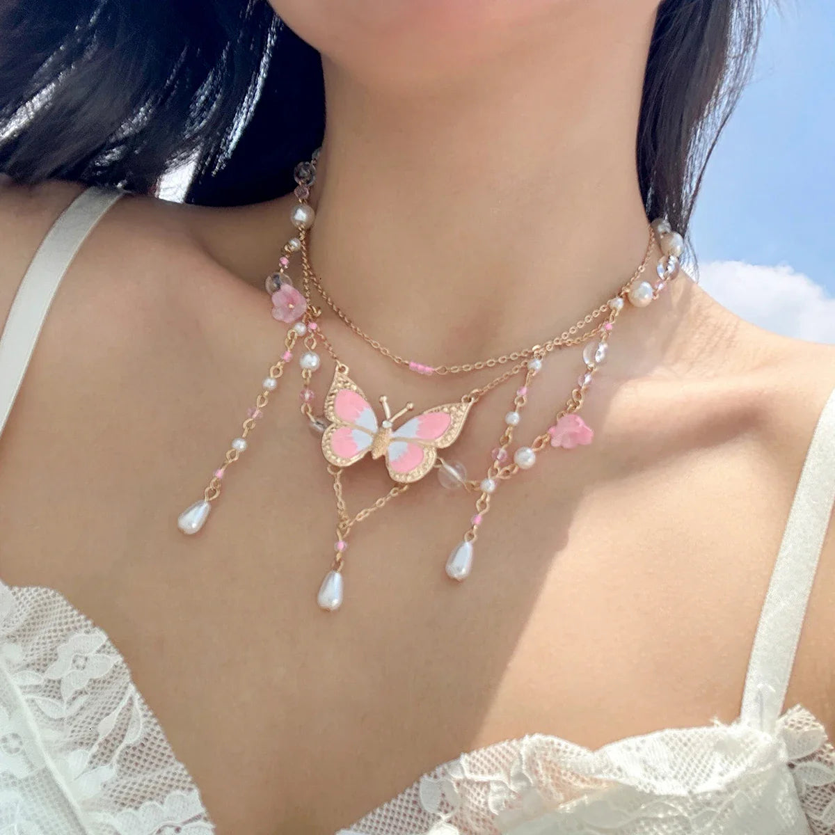 Collier multicouche en perles d'imitation papillon