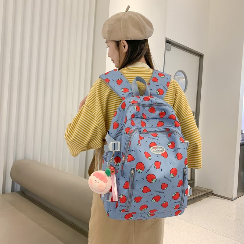 Sac à dos imperméable à imprimé fraise