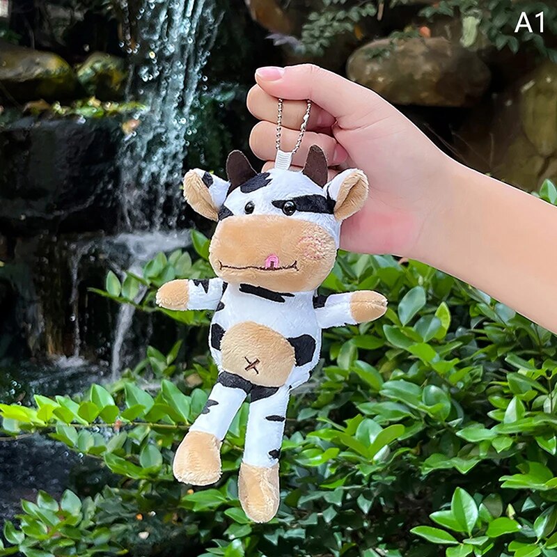 Llavero con colgante de peluche de vaca