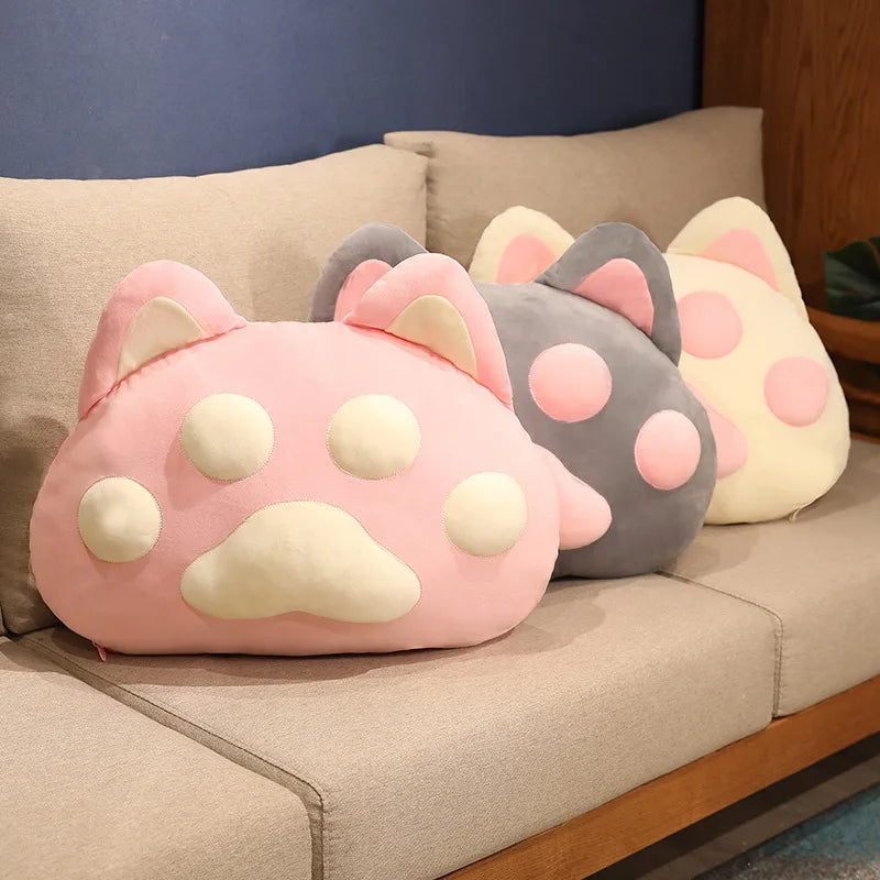 Almohadas gigantes con forma de pata de gato