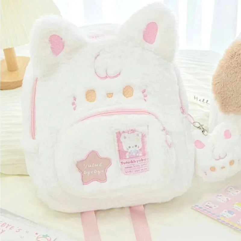 Sac à dos en peluche rose et blanc pour chat