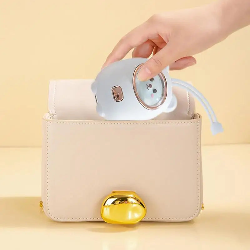 Chauffe-mains rechargeable en forme d'ours