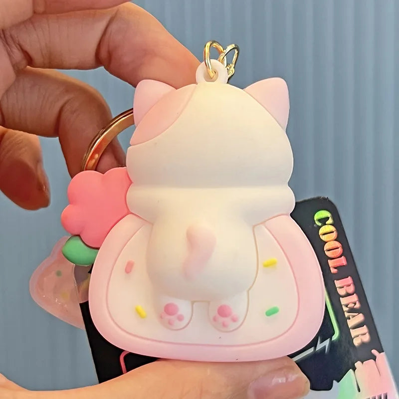 Porte-clés chat en forme de gâteau roulé