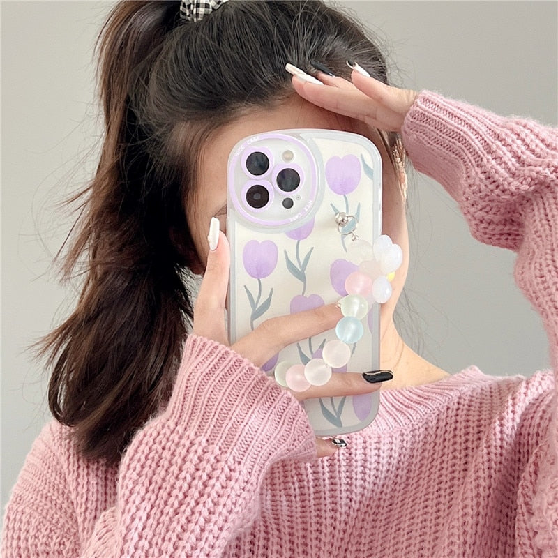 Funda blanda para iPhone con diseño de flores y cadenas