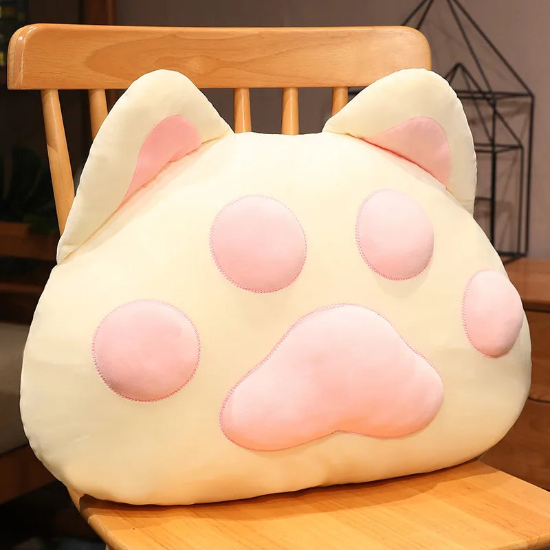 Almohadas gigantes con forma de pata de gato