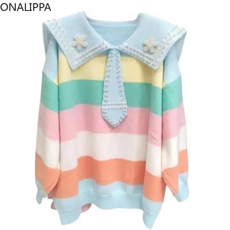 Pull marin à rayures arc-en-ciel pastel