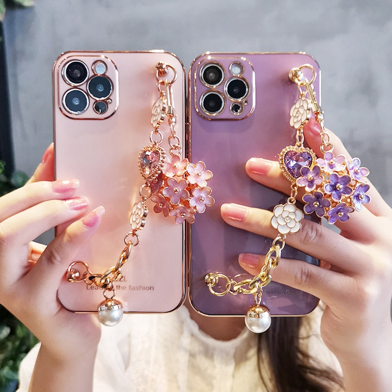 Funda para teléfono con colgante de gemas y flores