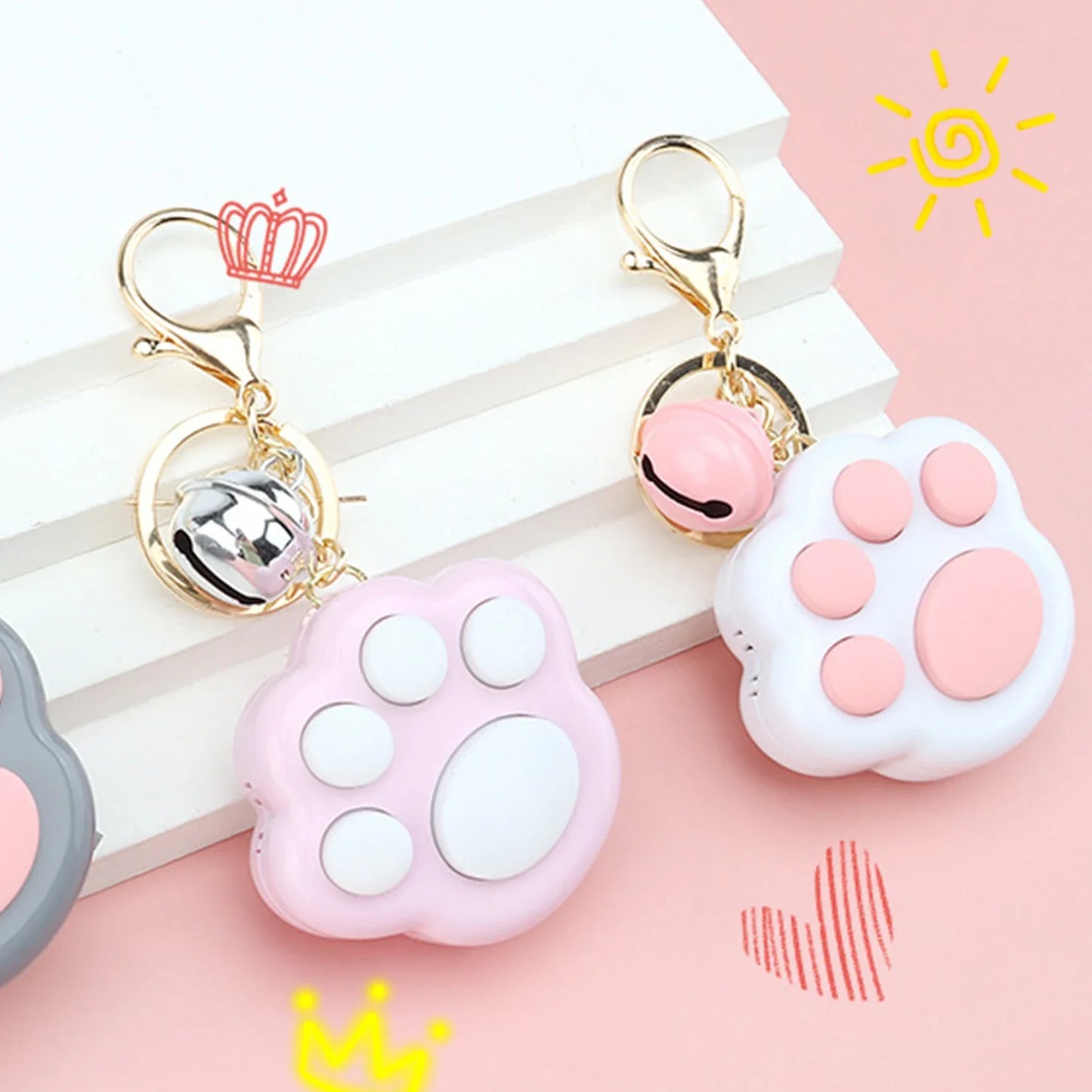 Llavero con juego de memoria de pata de gato
