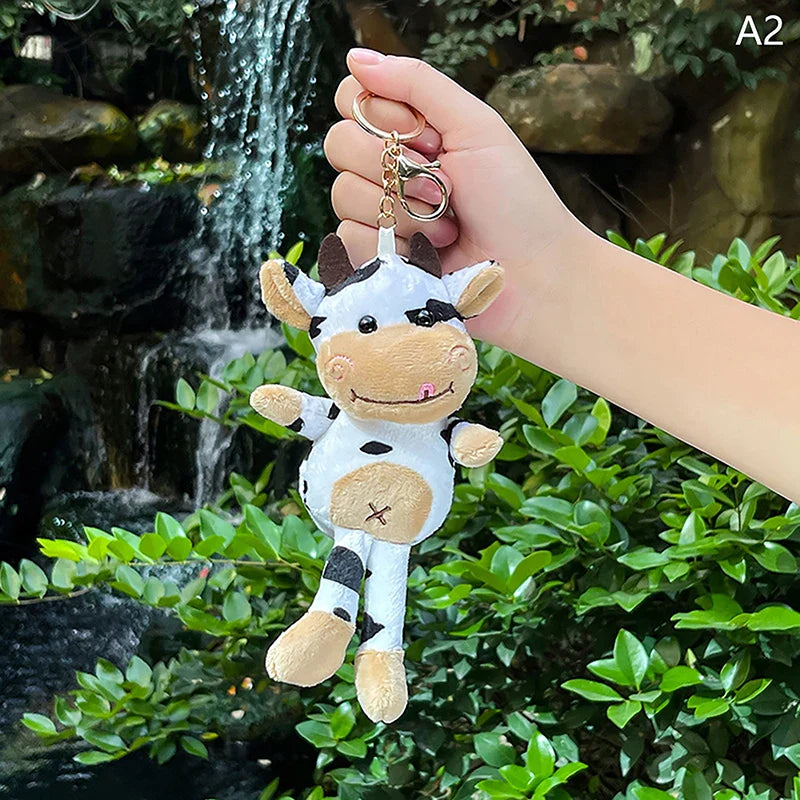 Llavero con colgante de peluche de vaca