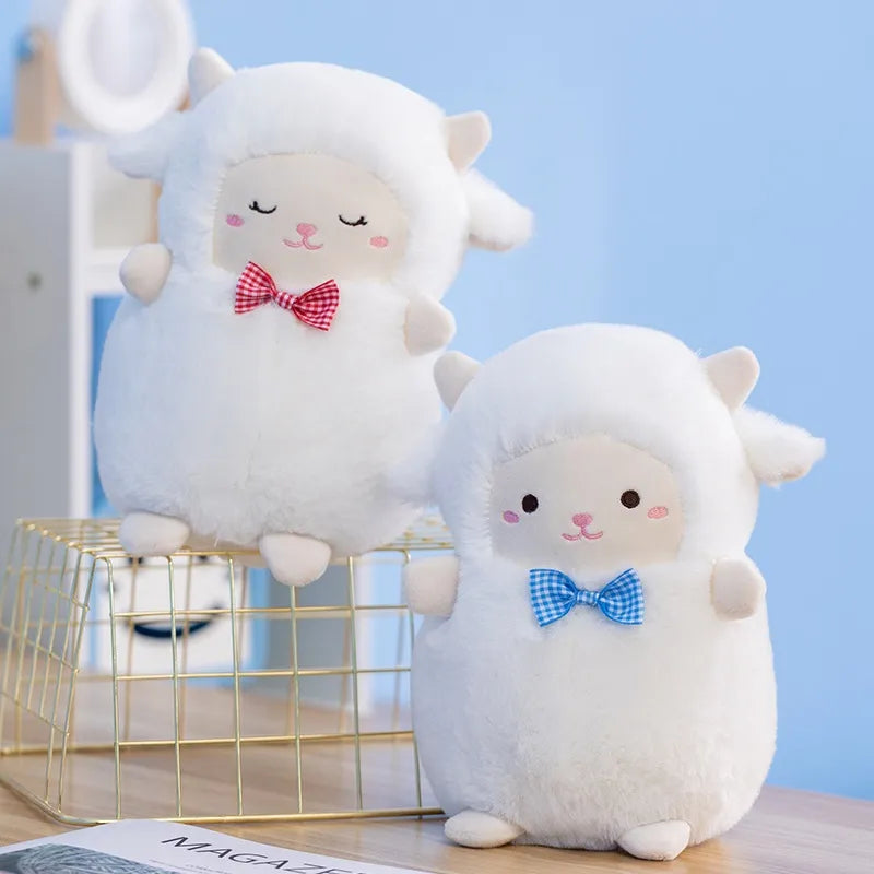 Peluches de oveja con pajarita