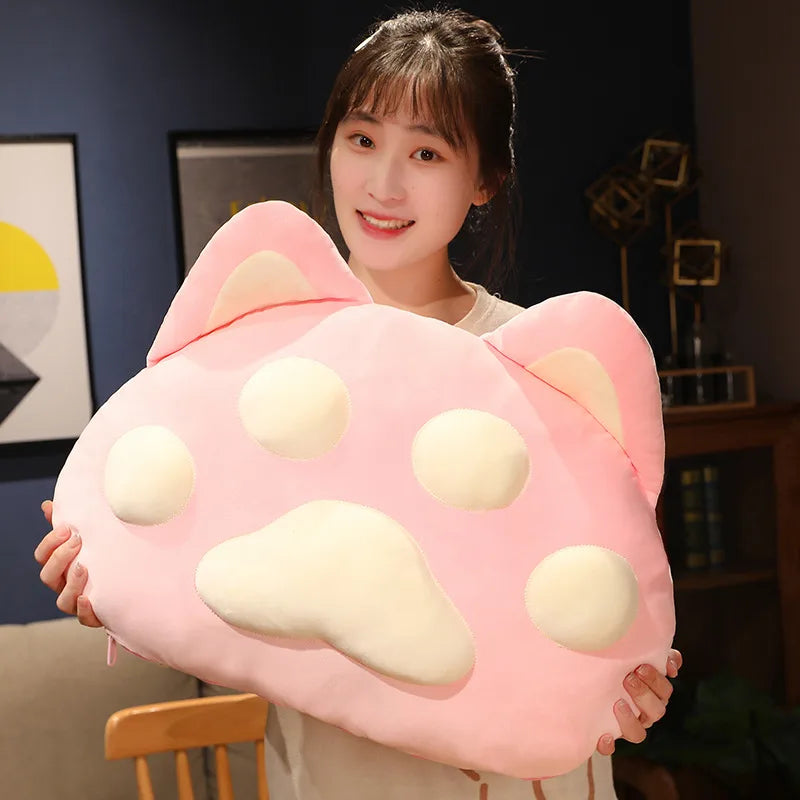 Almohadas gigantes con forma de pata de gato