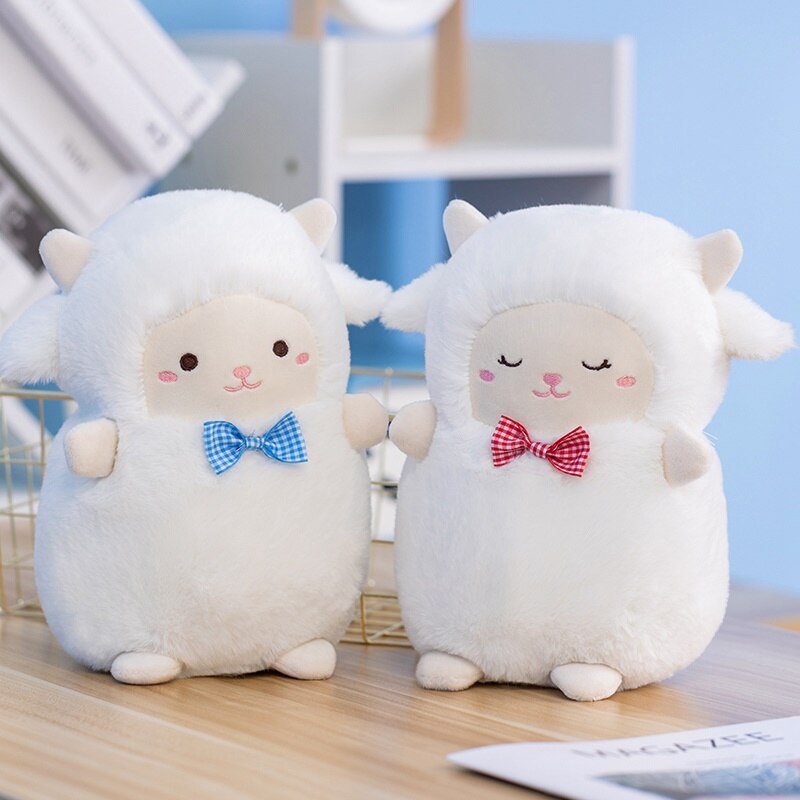 Peluches de oveja con pajarita
