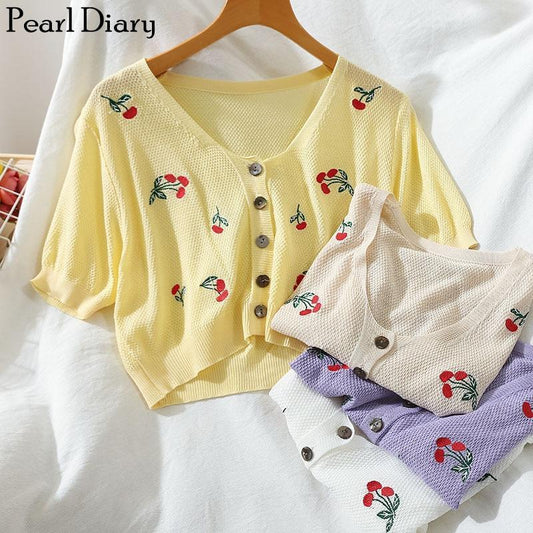 Cardigan court en tricot fleuri