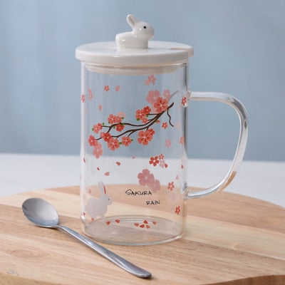 Tasses en fleurs de cerisier avec couvercle et cuillère