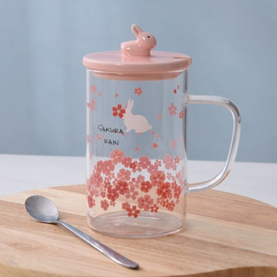 Tasses en fleurs de cerisier avec couvercle et cuillère
