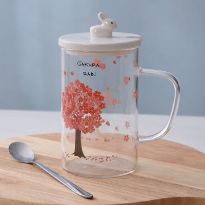 Tasses en fleurs de cerisier avec couvercle et cuillère