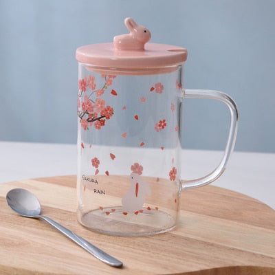Tasses en fleurs de cerisier avec couvercle et cuillère