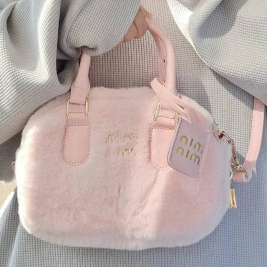 Sac à main tendance en peluche rose