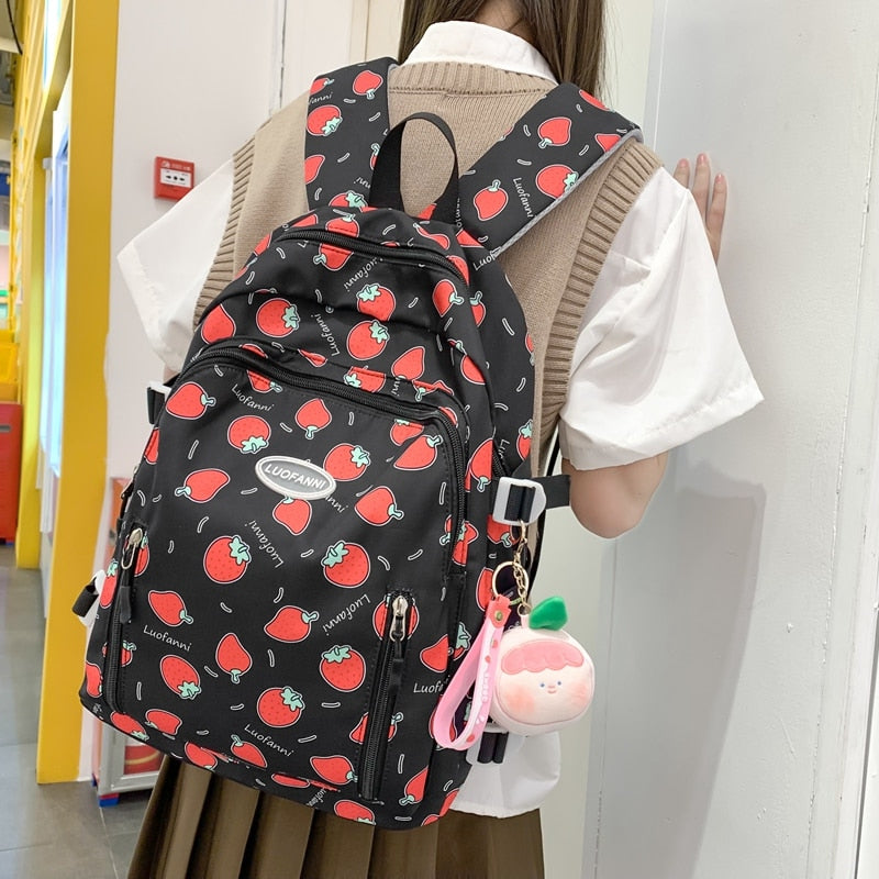 Sac à dos imperméable à imprimé fraise