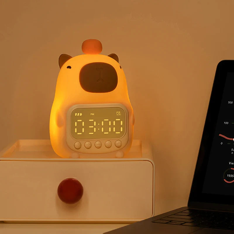Reloj despertador con luz nocturna de carpincho