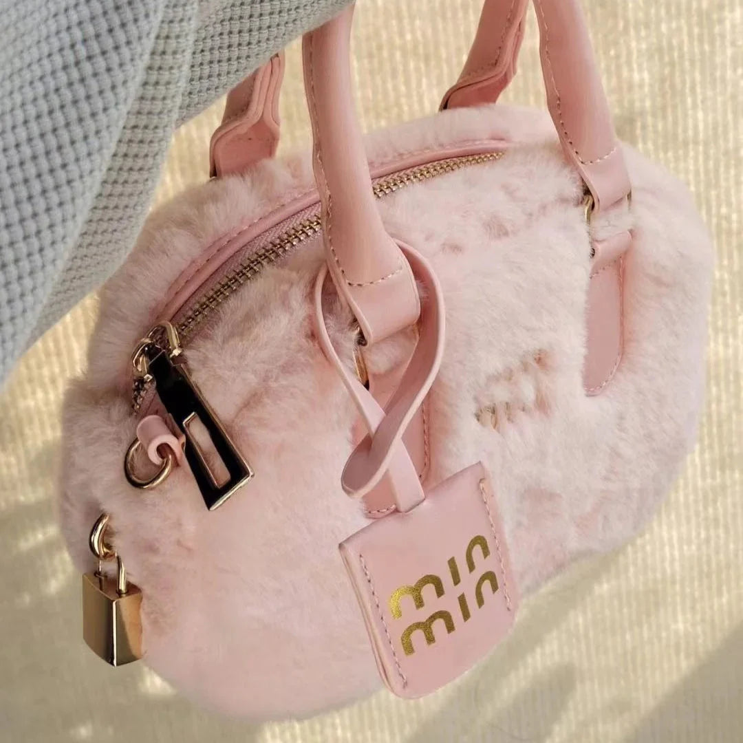 Sac à main tendance en peluche rose