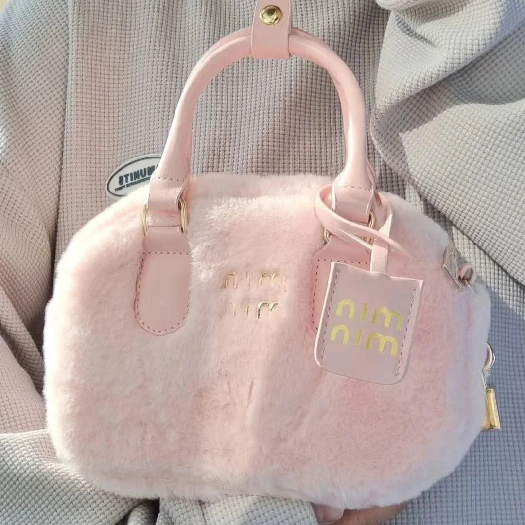 Sac à main tendance en peluche rose