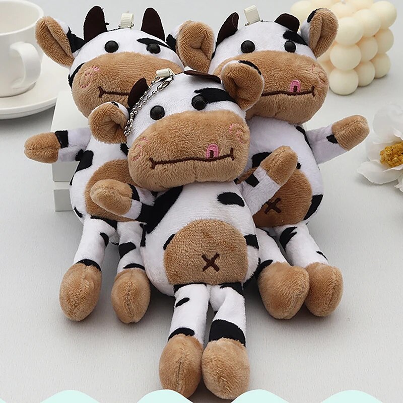 Llavero con colgante de peluche de vaca