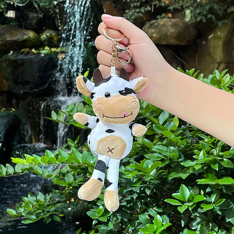 Llavero con colgante de peluche de vaca