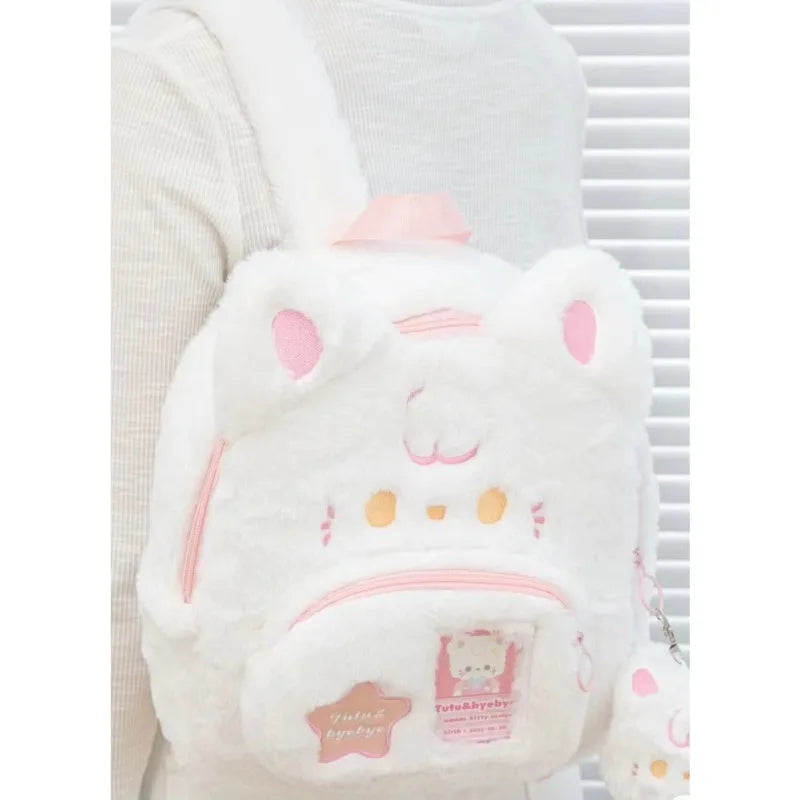 Sac à dos en peluche rose et blanc pour chat