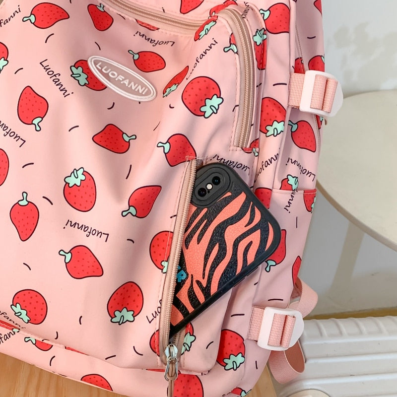 Sac à dos imperméable à imprimé fraise