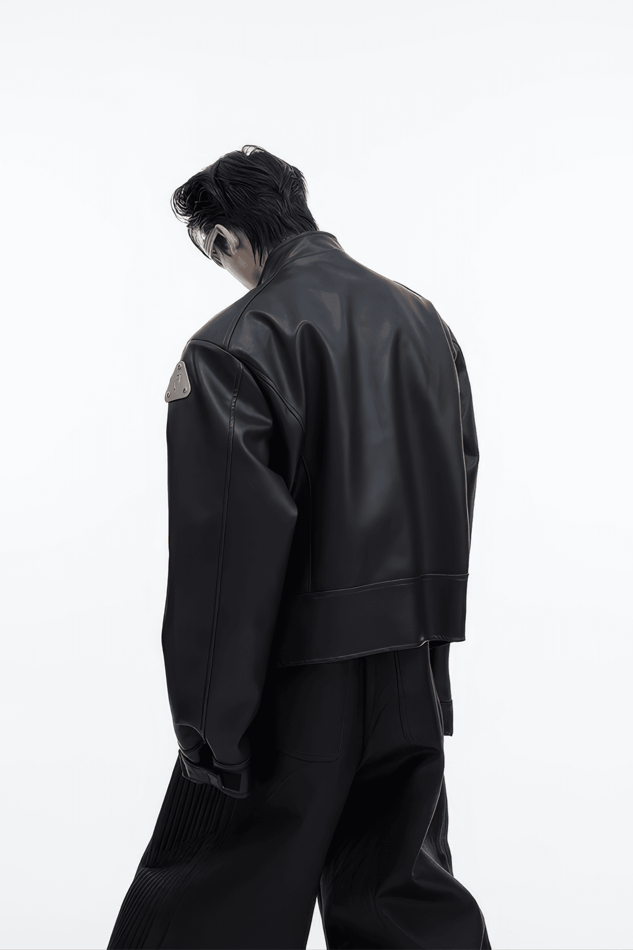 Short Leather Jacket – Modern Sculptural Design with Metal Logo