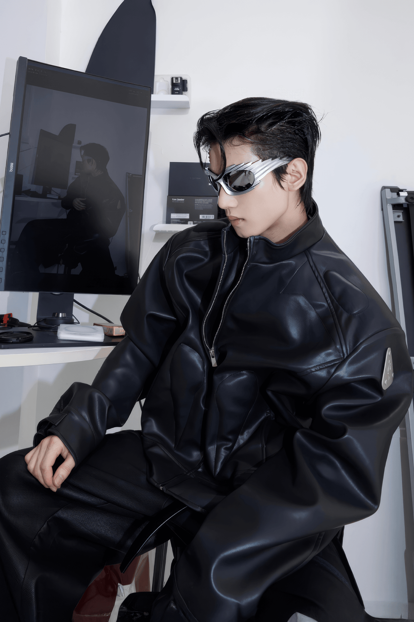 Short Leather Jacket – Modern Sculptural Design with Metal Logo