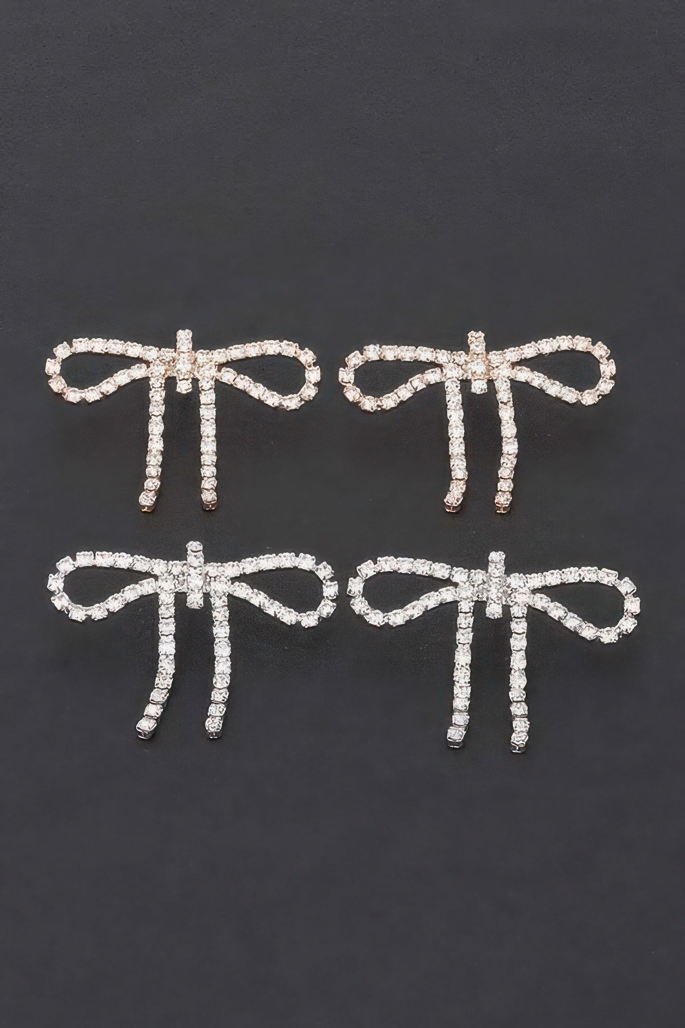 Boucles d'oreilles pendantes nœud strass cristal