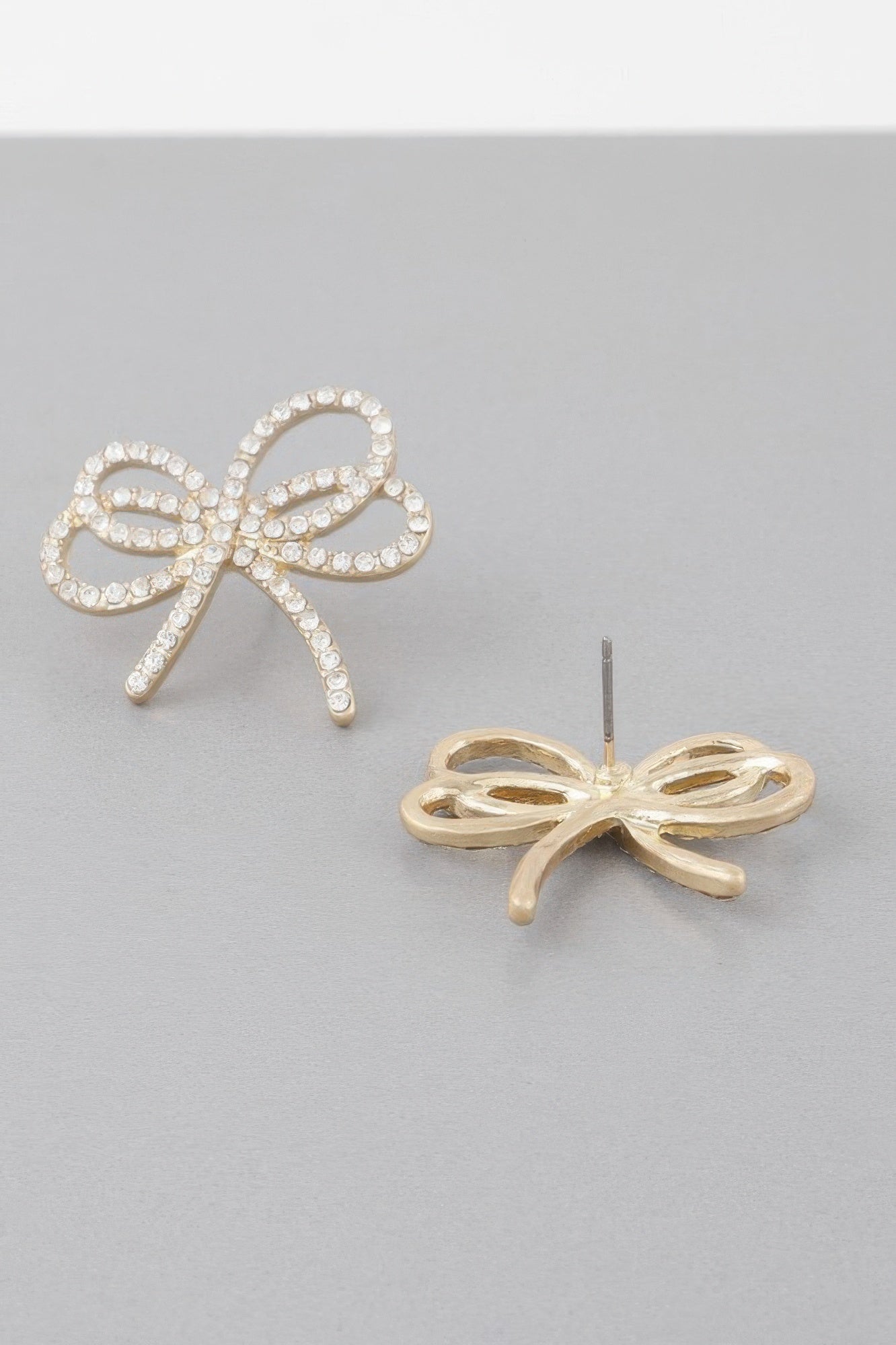 Boucles d'oreilles ruban doublement ornées