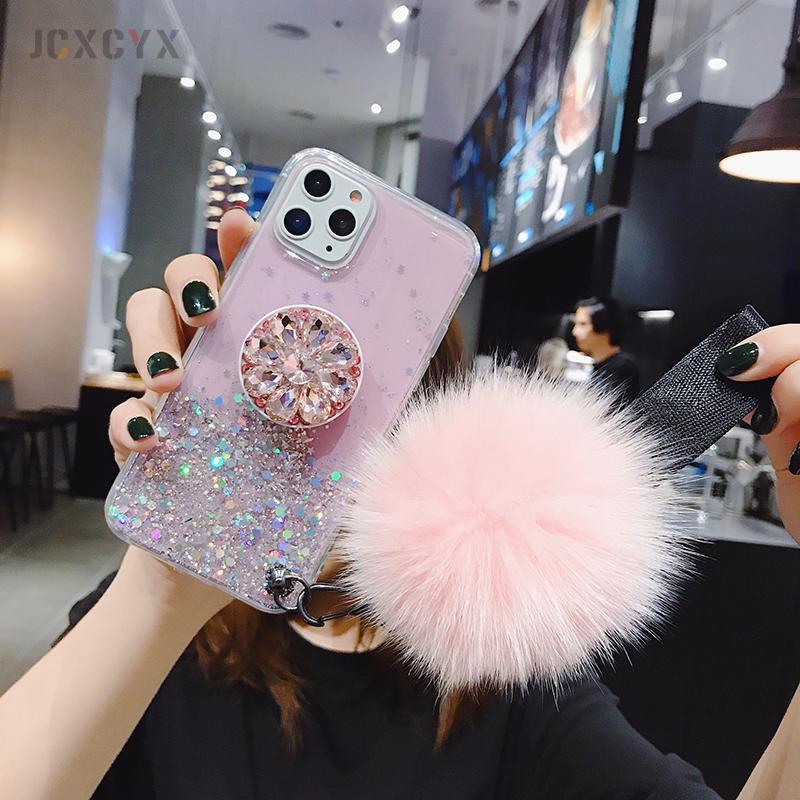 Funda para teléfono con purpurina, soporte y pompón rosa